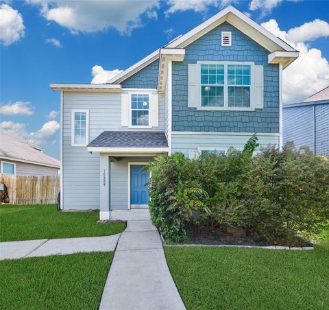 Photo of 10889 S Lake Mist Lane, Willis, TX 77318 (MLS # 67416784)