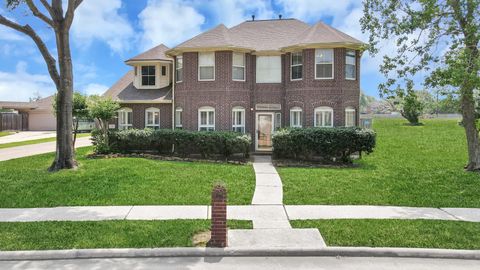 Photo of 410 Barberry Lane, Baytown, TX 77520 (MLS # 54821657)