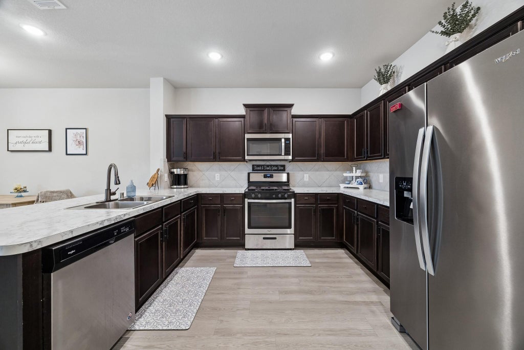 Photo of 12683 Taymouth Manor Drive #6, Humble, TX 77346 (MLS # 39011878)