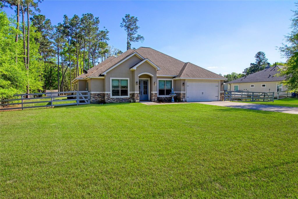 Photo of 27684 Rio Blanco Drive, Splendora, TX 77372 (MLS # 63279279)