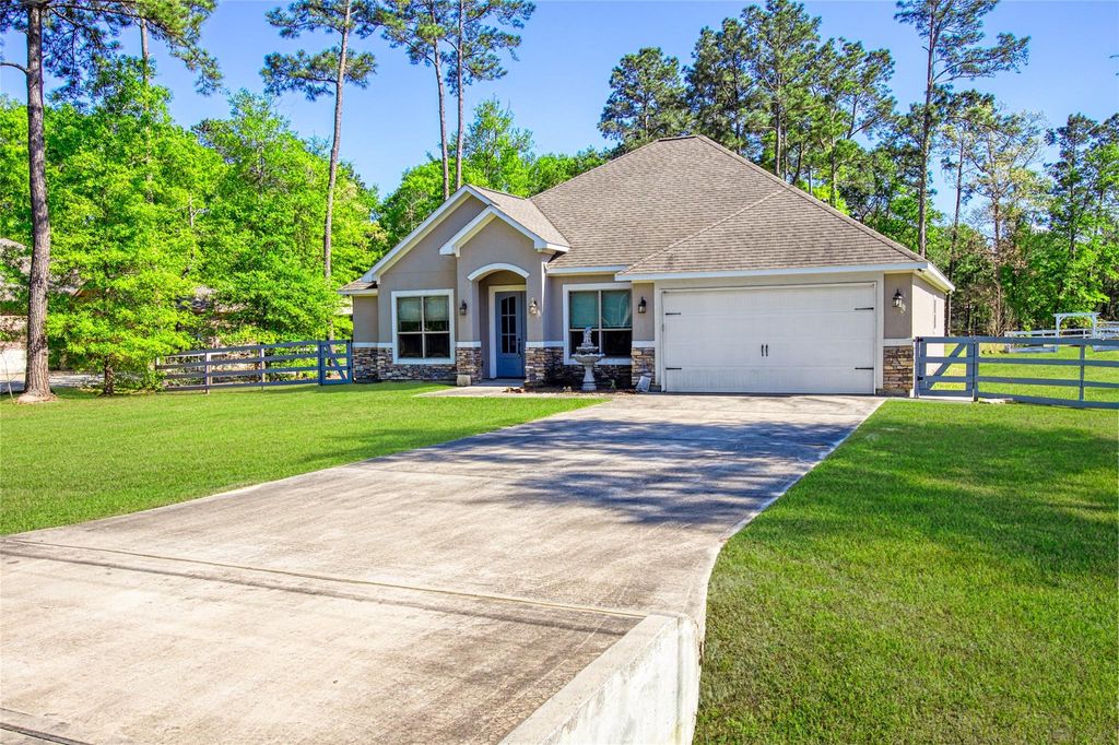 Photo of 27684 Rio Blanco Drive, Splendora, TX 77372 (MLS # 63279279)