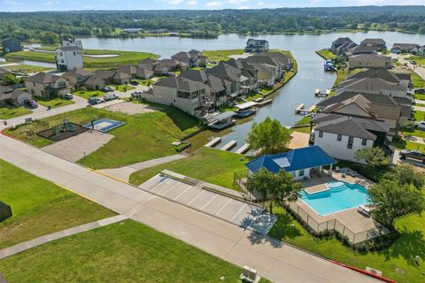 Photo of 10780 S Lake Mist Lane S, Willis, TX 77318 (MLS # 34253435)