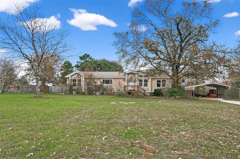 Photo of 11735 E Old Oak Trail, Willis, TX 77378 (MLS # 22847702)