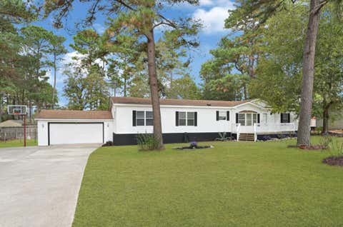 Photo of 26410 Country Woods Trail, Magnolia, TX 77355 (MLS # 38365415)