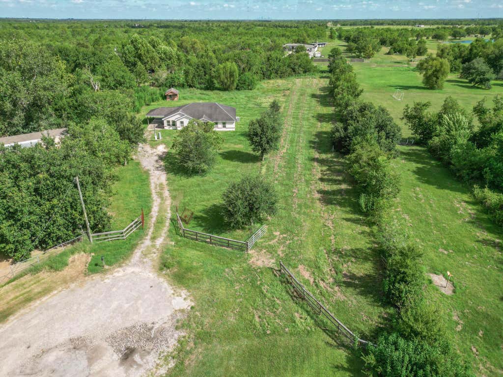 Photo of 1499 County Road 393b, Alvin, TX 77511 (MLS # 42467635)