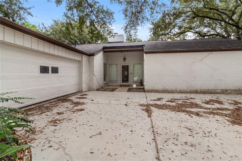 Photo of 11302 Piping Rock Drive, Houston, TX 77077 (MLS # 70030609)