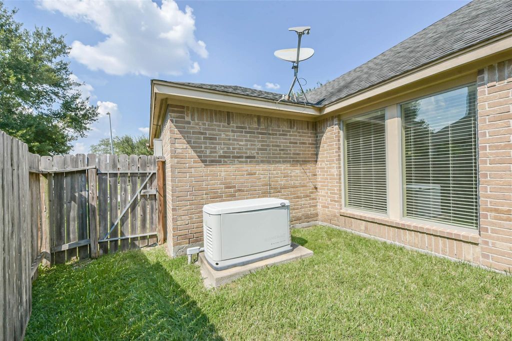 Photo of 13010 Gentle Water Drive, Houston, TX 77044 (MLS # 81159612)