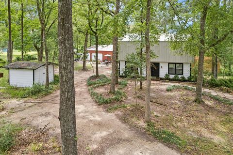 Photo of 10765 Champion Forest Road, Conroe, TX 77303 (MLS # 40589912)