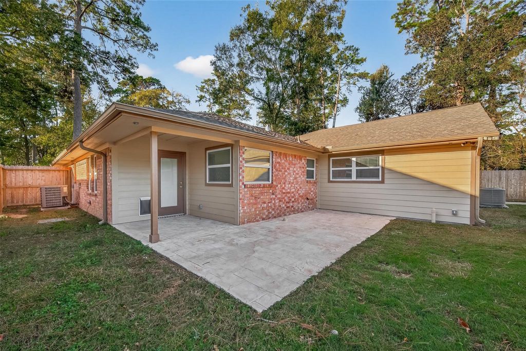 Photo of 2103 Woodway Drive, New Caney, TX 77357 (MLS # 72879576)
