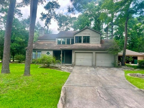 Photo of 51 Split Rock Rd Road, The Woodlands, TX 77381 (MLS # 41001168)