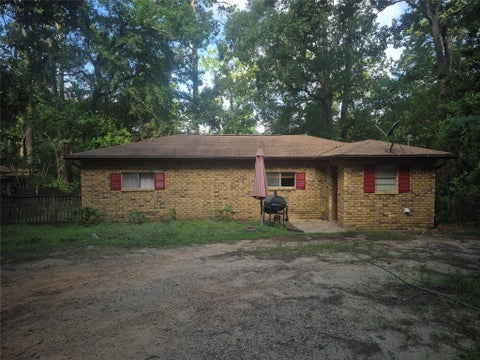 Photo of 8312 Elm Drive, Montgomery, TX 77316 (MLS # 92055070)