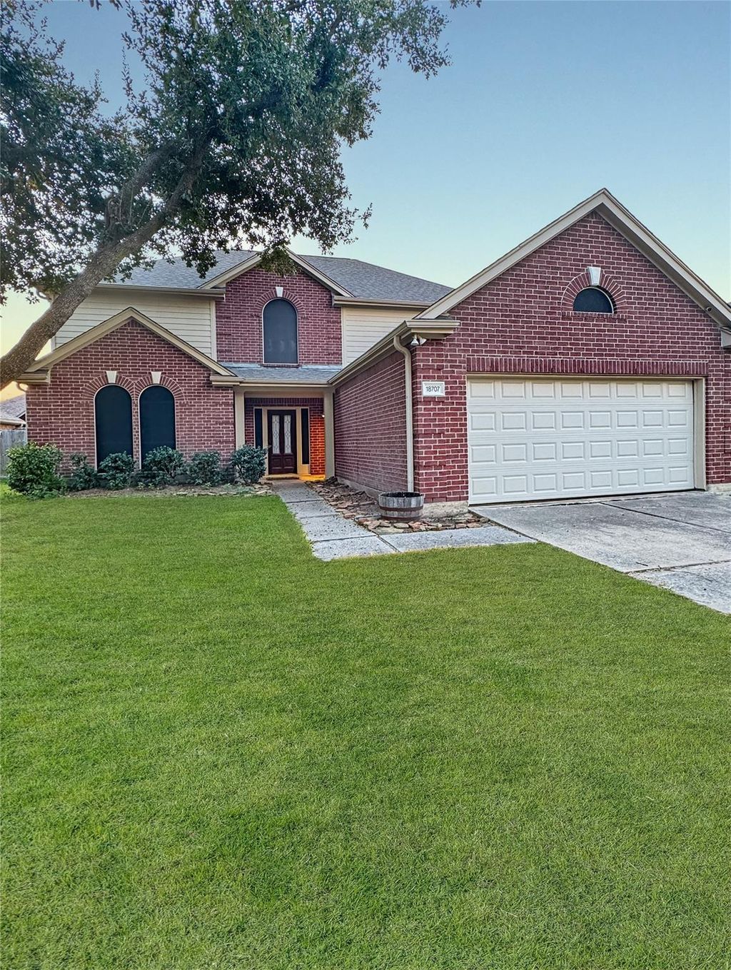 Photo of 18707 Woodbreeze Drive, Humble, TX 77346 (MLS # 50976835)
