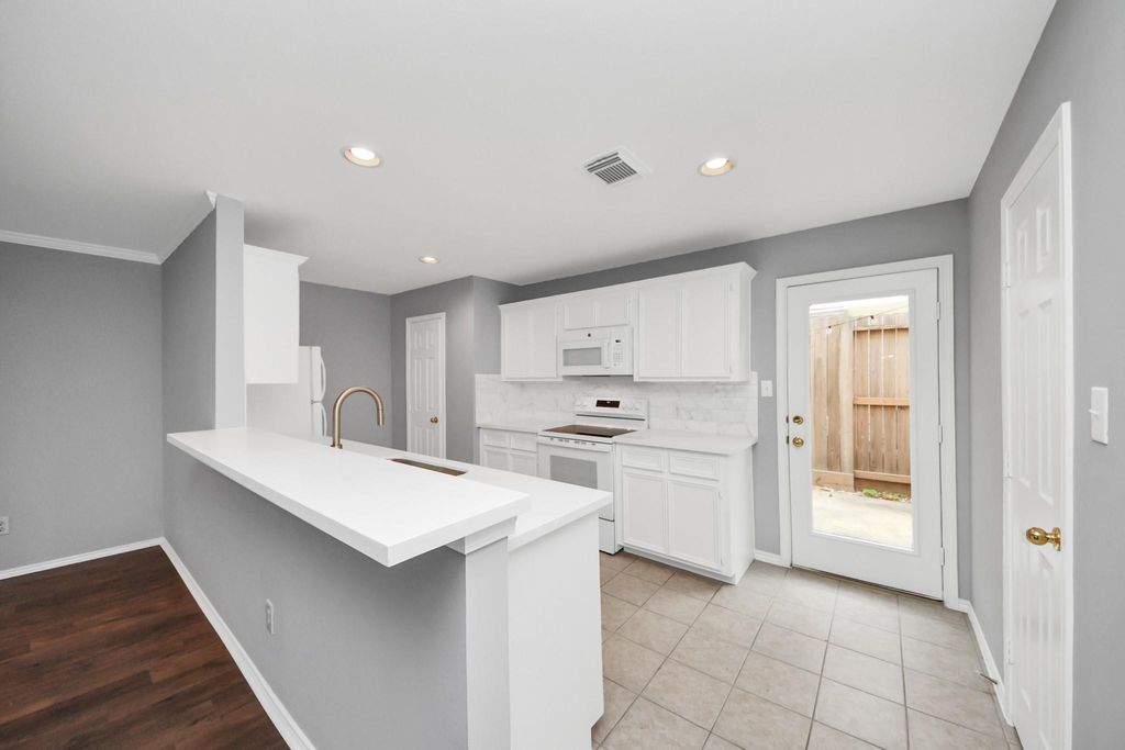 Photo of 1714 Redwing Bluff Drive, Houston, TX 77009 (MLS # 81039413)