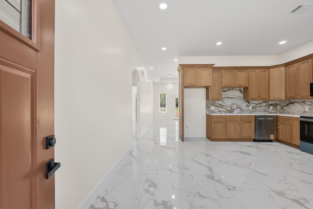 Photo of 107 County Road 3372, Cleveland, TX 77327 (MLS # 55544956)