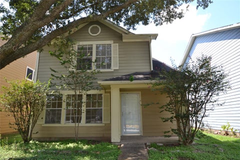 Photo of 3811 E Traditions Court, Houston, TX 77082 (MLS # 22091346)