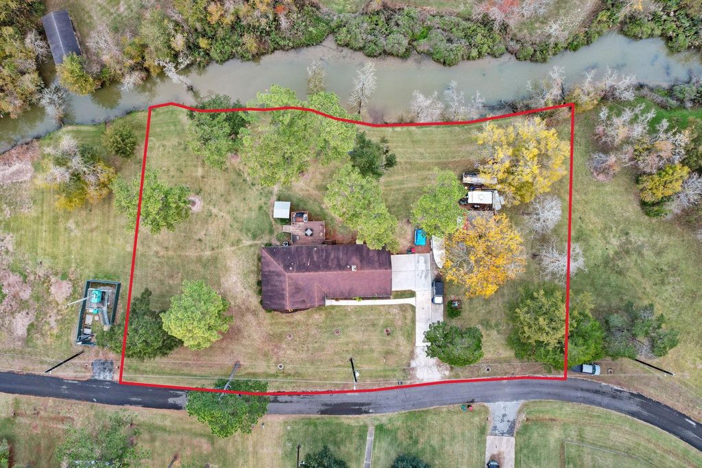 Photo of 203 N Bayou Bend Drive, Baytown, TX 77521 (MLS # 90443477)