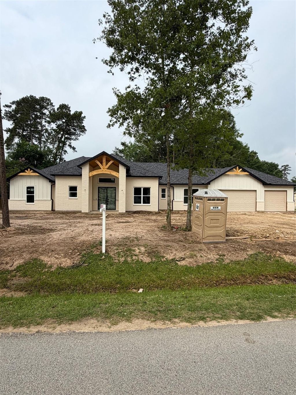 Photo of 114 Magnolia Bend Bnd, Roman Forest, TX 77357 (MLS # 70647413)
