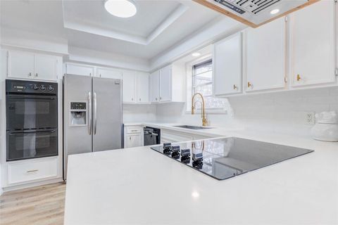 Photo of 10720 Briar Forest Drive #32, Houston, TX 77042 (MLS # 31330020)