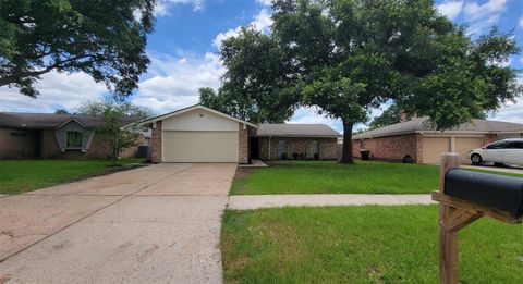 Photo of 7646 Winkle Wood Lane, Houston, TX 77086 (MLS # 20322754)