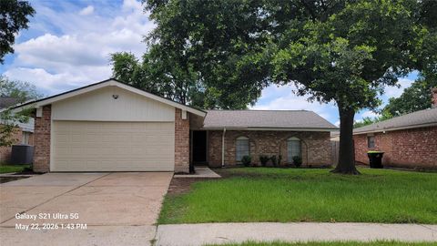 Photo of 7646 Winkle Wood Lane, Houston, TX 77086 (MLS # 20322754)