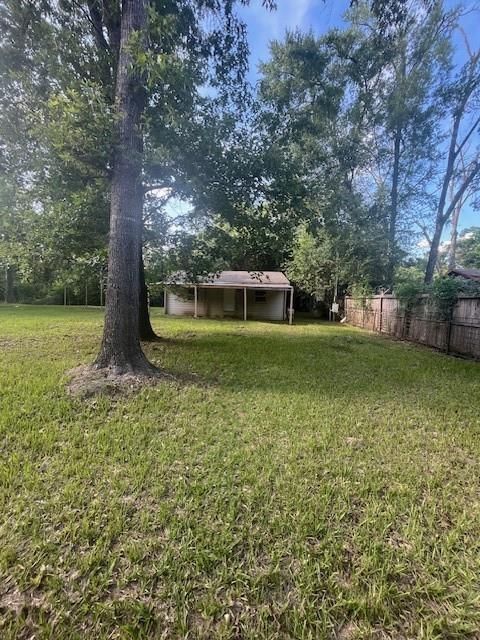 Photo of 411 Richard Street, Coldspring, TX 77331 (MLS # 96259118)
