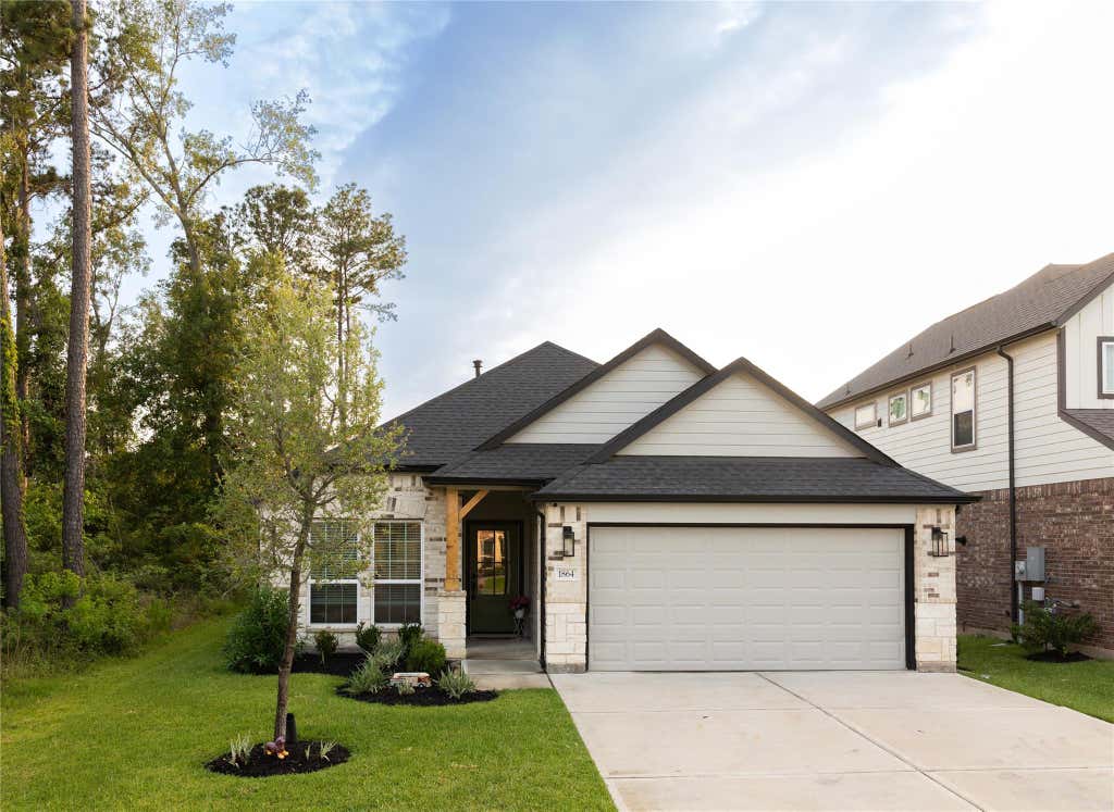 Photo of 1864 Cypress Canyon Trail, Conroe, TX 77301 (MLS # 46958388)