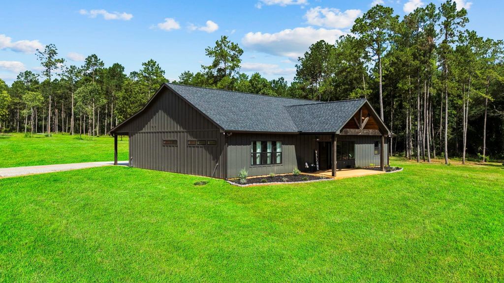 Photo of 769 Lost Lake, Livingston, TX 77351 (MLS # 64177316)