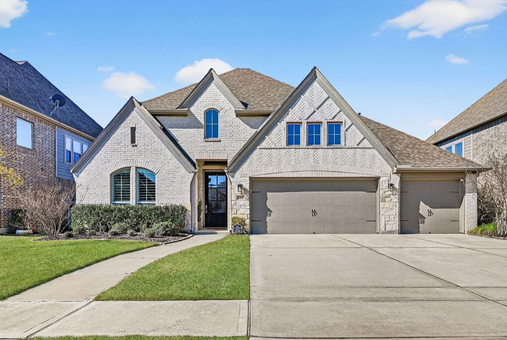 Photo of 25121 Pinebrook Grove Lane, Tomball, TX 77375 (MLS # 54714095)