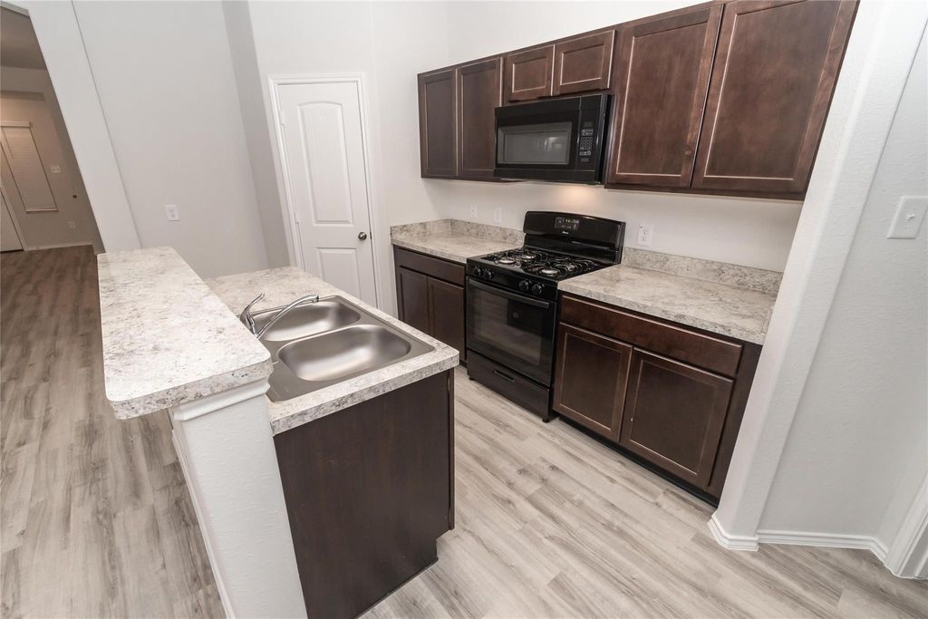 Photo of 24026 Treviso Gardens DR, Katy, TX 77493 (MLS # 20450387)