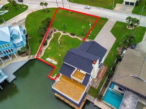 Photo of 50 Tiki Drive, Tiki Island, TX 77554 (MLS # 16761151)