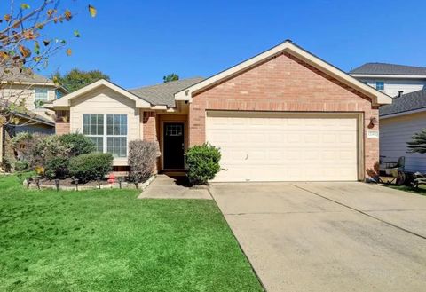 Photo of 12411 Meadow Frost Lane, Houston, TX 77044 (MLS # 20896456)