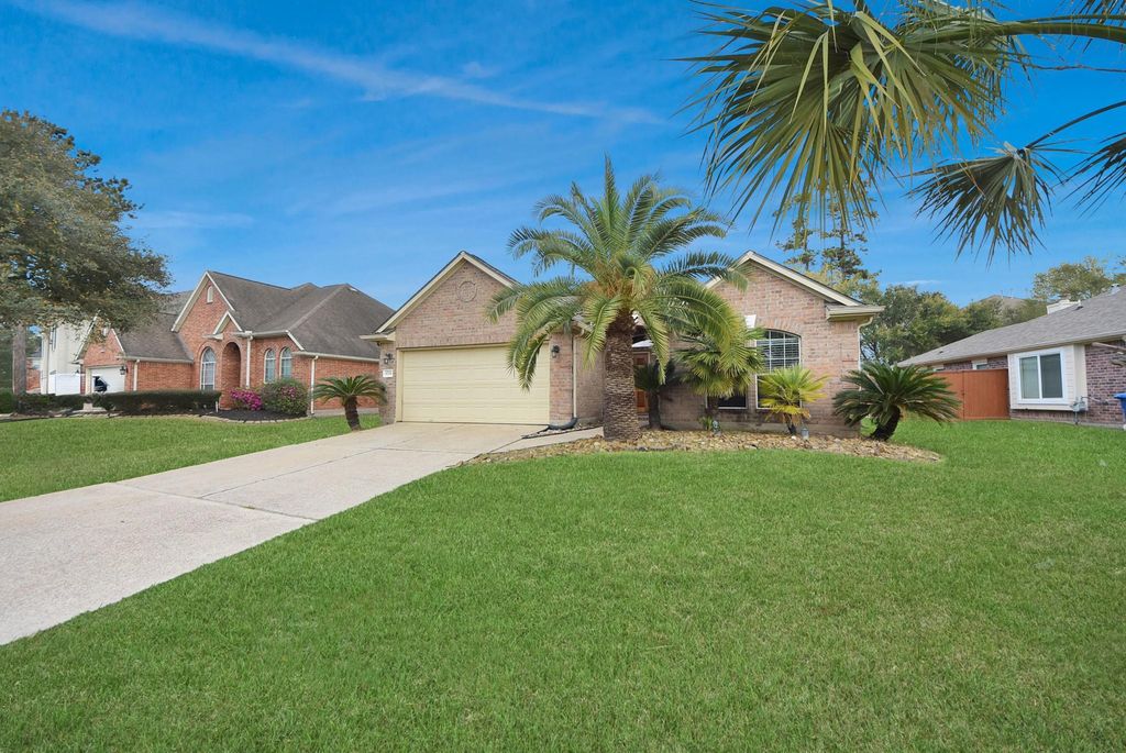 Photo of 8719 Sailing Drive, Humble, TX 77346 (MLS # 85942759)