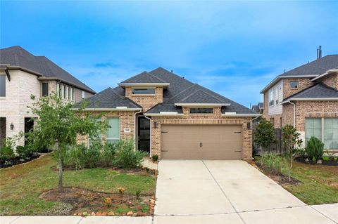 Photo of 31410 Golden Cliffs Lane Ln, Fulshear, TX 77441 (MLS # 17436820)