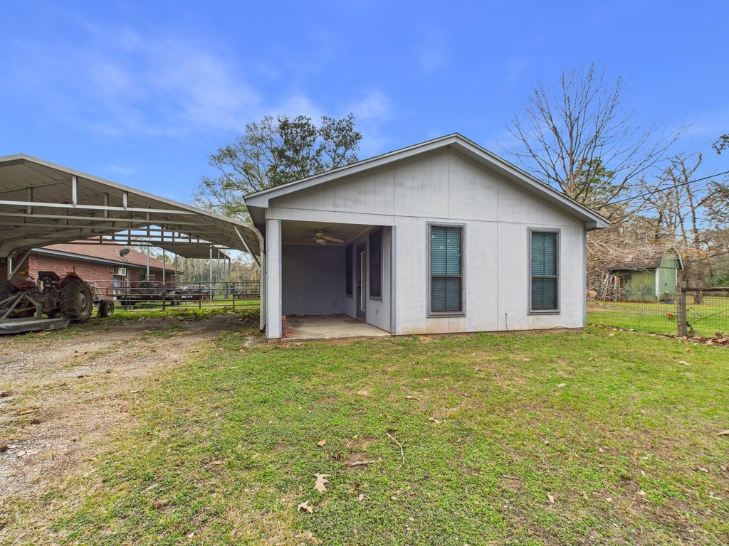Photo of 15802 Firetower Road #A, Conroe, TX 77306 (MLS # 96830333)