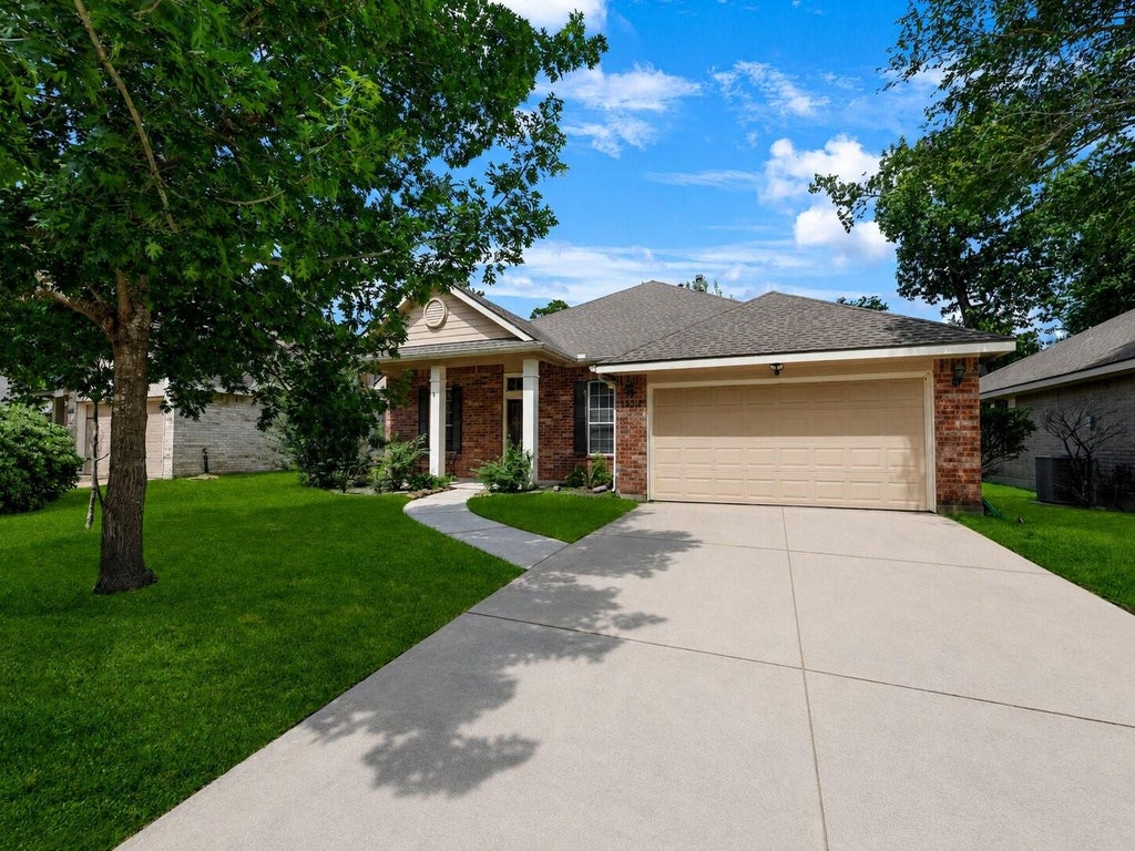 Photo of 18311 Wild Lilac Trail, Humble, TX 77346 (MLS # 96937639)