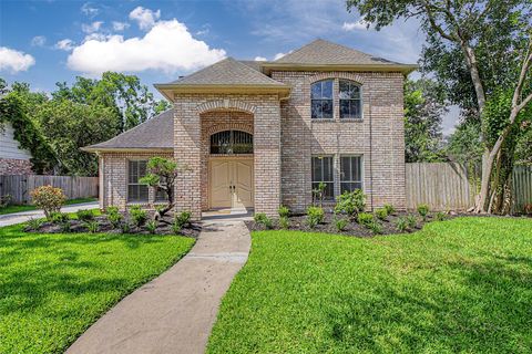 Photo of 11651 Trailmont Drive, Houston, TX 77077 (MLS # 35861192)
