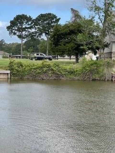 Photo of 7 Peninsula Point, Huntsville, TX 77340 (MLS # 36760783)