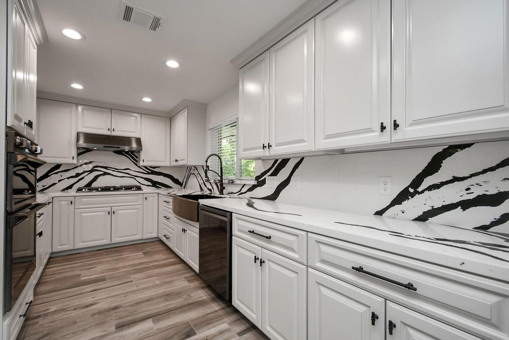 Photo of 1805 East Avenue, Katy, TX 77493 (MLS # 77402532)