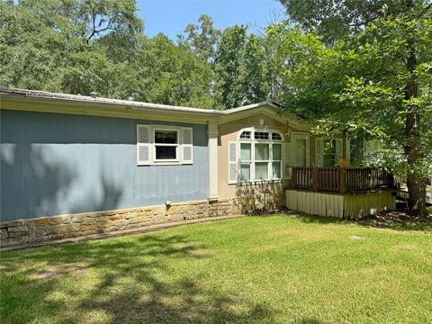 Photo of 159 E Lumbermans Road, Onalaska, TX 77360 (MLS # 55405948)