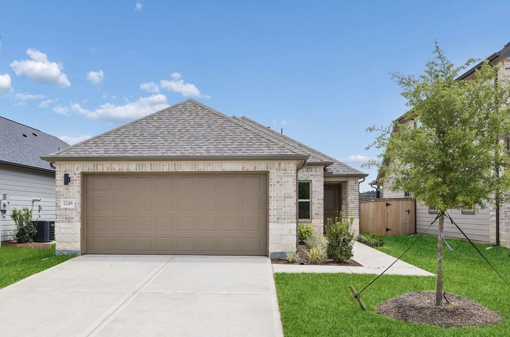 Photo of 1248 Minorca Street, Huffman, TX 77336 (MLS # 50976011)