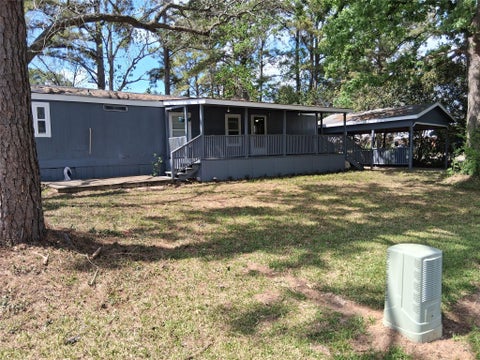 Photo of 11797 White Cedar Street, Willis, TX 77318 (MLS # 55550762)