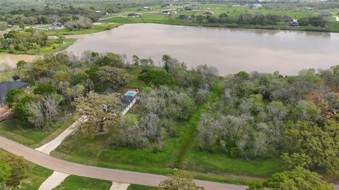 Photo of 21502 Chenango Lake Drive, Angleton, TX 77515 (MLS # 71569362)