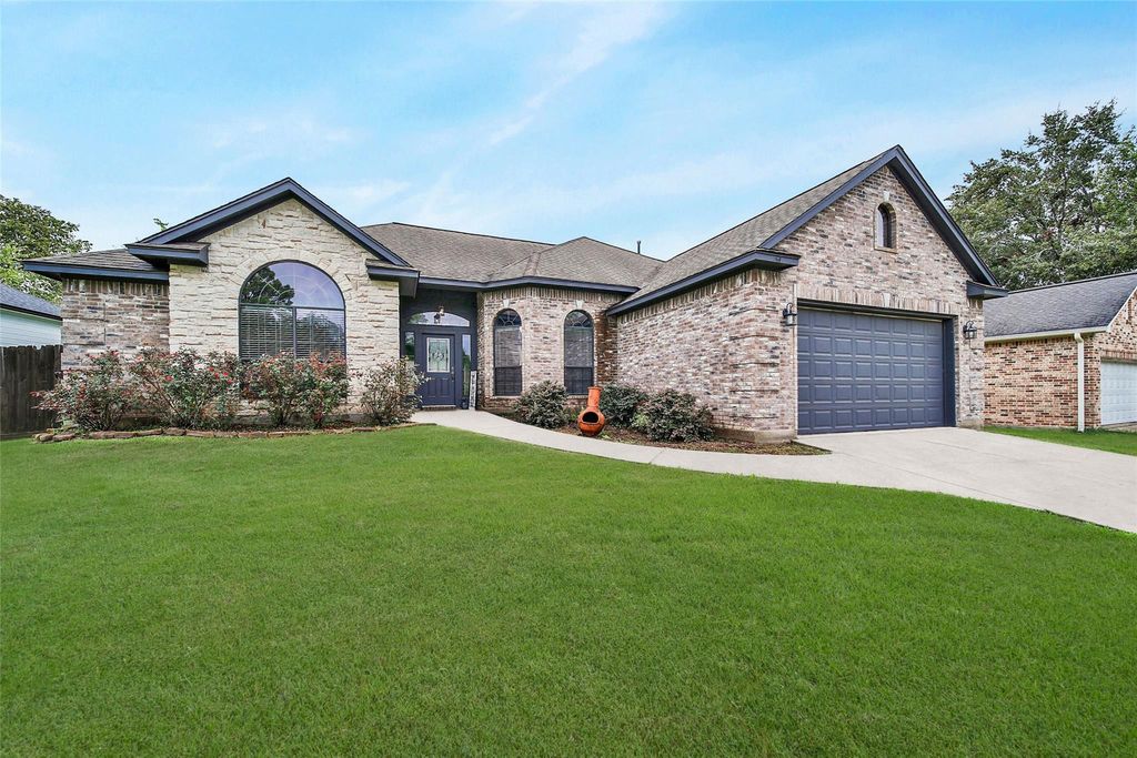 Photo of 12802 Point Aquarius Boulevard, Willis, TX 77318 (MLS # 40918192)