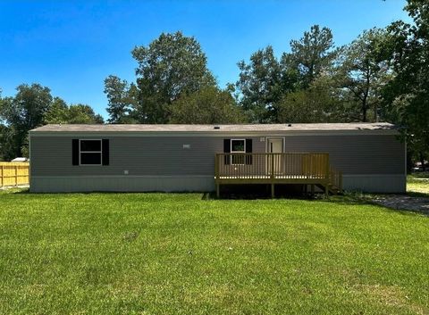 Photo of 20033 Red Oak S, New Caney, TX 77357 (MLS # 33261058)