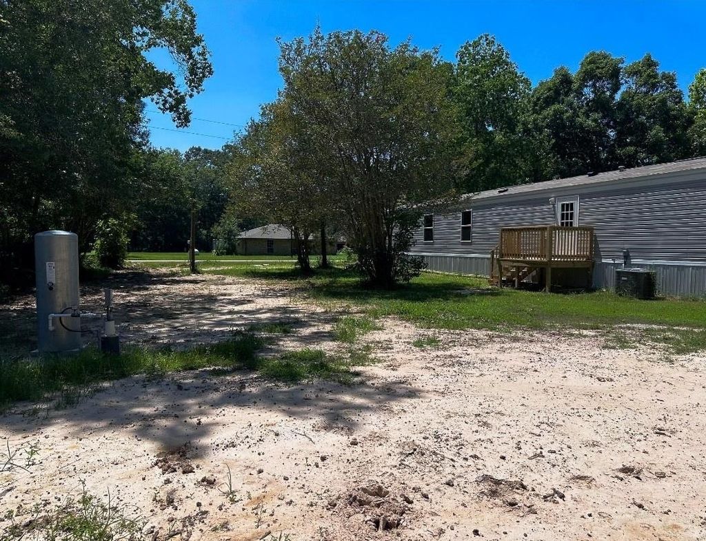 Photo of 20033 Red Oak S, New Caney, TX 77357 (MLS # 33261058)