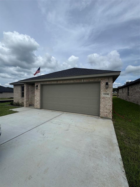 Photo of 13194 Lake Conroe Bay Road, Willis, TX 77318 (MLS # 67776934)