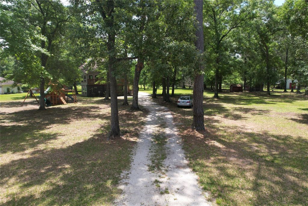 Photo of 512 County Road 337, Cleveland, TX 77327 (MLS # 10470820)