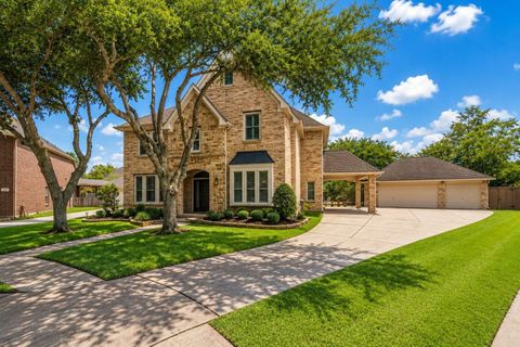 Photo of 13222 Dusty Grove Lane, Sugar Land, TX 77498 (MLS # 54415201)