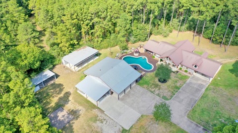 Photo of 22 Mount Zion Road, New Waverly, TX 77358 (MLS # 18090530)