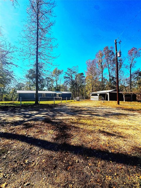 Photo of 1405 May Drive, Onalaska, TX 77360 (MLS # 61467439)